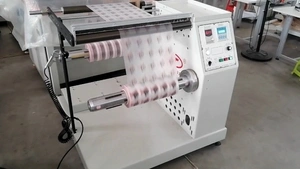 Cantilevered Winder with Web Guide